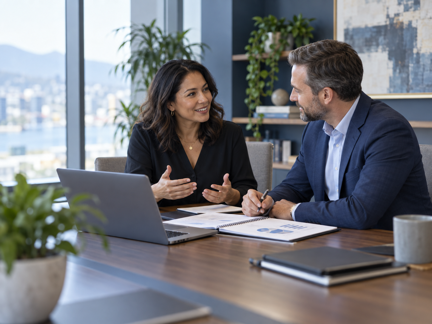 Business owners discussing a plan with an advisor